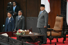 President Prabowo Subianto (right) arrives to deliver his annual State of the Nation Address, ahead of the country's Independence Day celebrations, in Jakarta on August 14, 2026.
