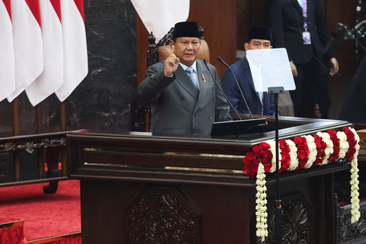 Indonesian President Prabowo Subianto gestures as he delivers his annual state of the nation address before the members of Parliament, while Vice President Gibran Rakabuming Raka sits next to him, ahead of the country's 81st Independence Day, in Jakarta,&nbsp;Indonesia, August 14, 2026. 