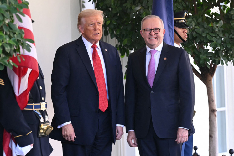 In this file photo, US President Donald Trump greets Australia's Prime Minister Anthony Albanese at the White House in Washington on October 20, 2025.