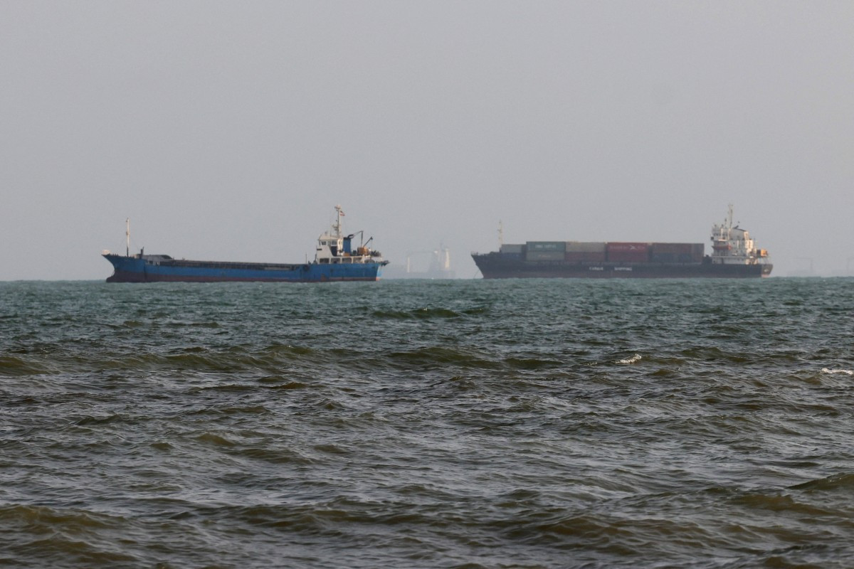 Vessels are seen in the Strait of Hormuz off the port city of Bandar Abbas in southern Iran on Aug. 10, 2026. 