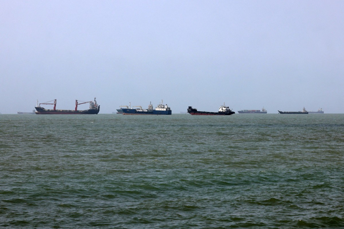 Vessels transit the Strait of Hormuz off Bandar Abbas in southern Iran on August 10, 2026.