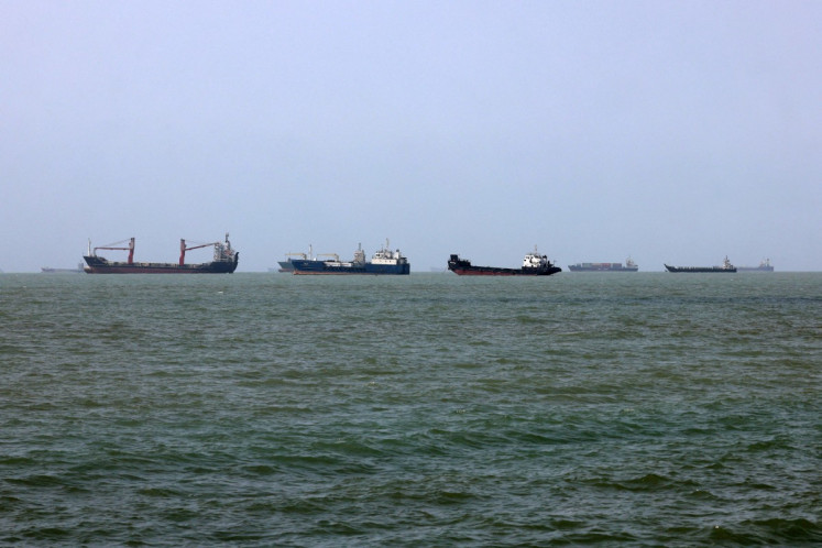 Vessels transit the Strait of Hormuz off Bandar Abbas in southern Iran on August 10, 2026.