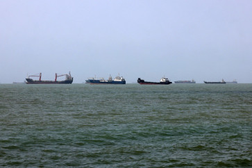 Vessels transit the Strait of Hormuz off Bandar Abbas in southern Iran on August 10, 2026.