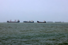 Vessels transit the Strait of Hormuz off Bandar Abbas in southern Iran on August 10, 2026.