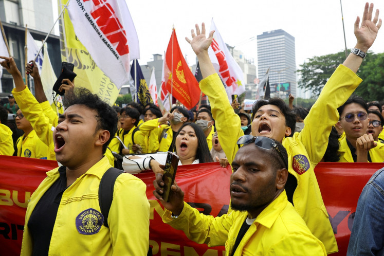 University of Indonesia (UI) students take part in a protest against wasteful state budget spending, President Prabowo Subianto's flagship programs and expanded military roles in civilian affairs in Central Jakarta, on Aug. 18, 2026.