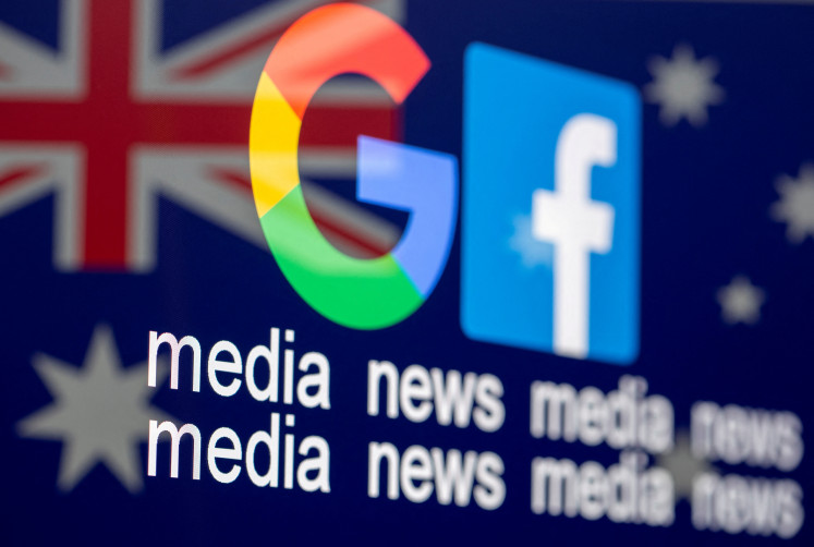 Google and Facebook logos, words &ldquo;media, news, media&ldquo; and Australian flag are displayed in this illustration taken, February 18, 2021.