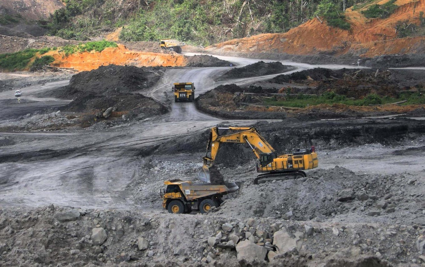 Heavy equipment is operated at a coal mine in East Kalimantan in this undated photograph.