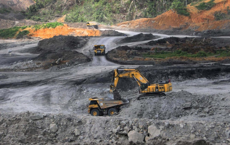 Heavy equipment is operated at a coal mine in East Kalimantan in this undated photograph.