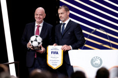 UEFA president Aleksander Ceferin (right) and FIFA president Gianni Infantino pose for a photograph during the 50th Ordinary UEFA congress in Brussels, Belgium on Feb. 12, 2026