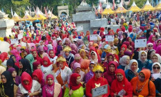 More than 1,000 women take part in a kebaya parade to celebrate National Kebaya Day, organized by the Indonesian Women's Congress (Kowani) in Palembang, South Sumatra on July 19, 2026.