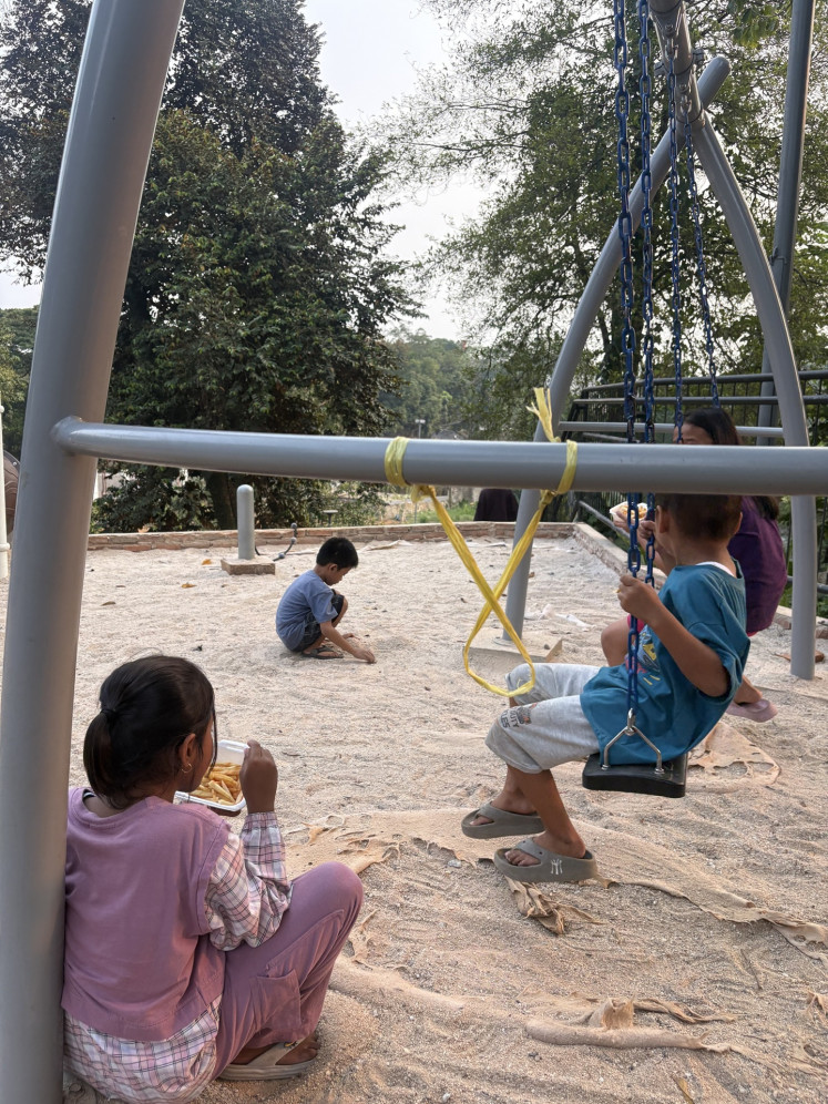 Sandbox playtime: Children hang out at Kampung Kandang Park in Jagakarsa, South Jakarta at around 4 p.m. on Aug. 10, 2026 to avoid being exposed to direct sunlight.