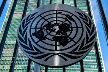 The United Nations (UN) logo is seen on a gate outside the UN headquarters ahead of the United Nations General Assembly (UNGA) in New York on September 21, 2025.