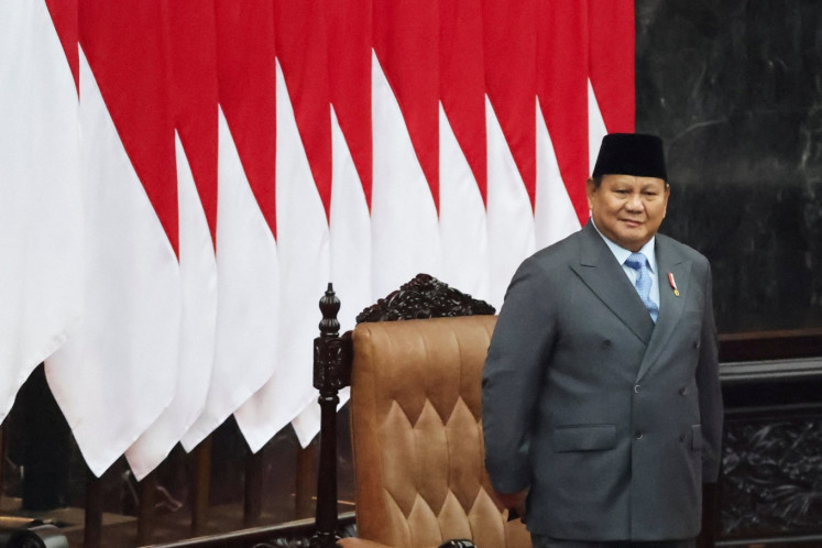 President Prabowo Subianto looks on as he arrives on Aug. 14 at the Senayan legislative complex in Central Jakarata for the People's Consultative Assembly (MPR) plenary meeting, in which he delivered the State of the Nation address and the 2027 state budget proposal. (Reuters/Stringer)