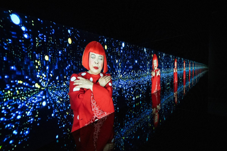 A video projection of &ldquo;Song of a Manhattan Suicide Addict&ldquo; by Japanese artist Yayoi Kusama is seen during the media preview of the exhibition &ldquo;I would overcome death and go on living&ldquo; at Yayoi Kusama Museum in Tokyo on October 16, 2024. Japanese avant-garde artist Yayoi Kusama, known as the &ldquo;polka dot queen&ldquo;, has died aged 97, a statement from her company said on August 27, 2026. 