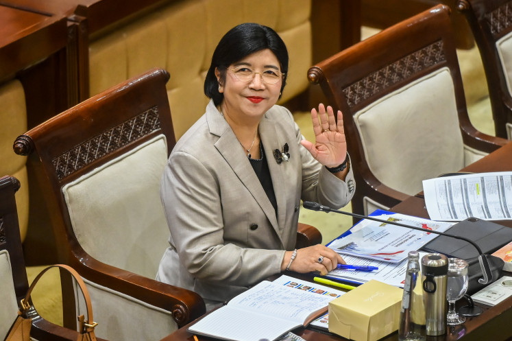 Acting Bank Indonesia (BI) governor Destry Damayanti prepares to undergo a fit and proper test with House of Representatives Commission XI on Aug. 26 at the Senayan legislative complex in Jakarta, following her nomination to become the central bank's official head.