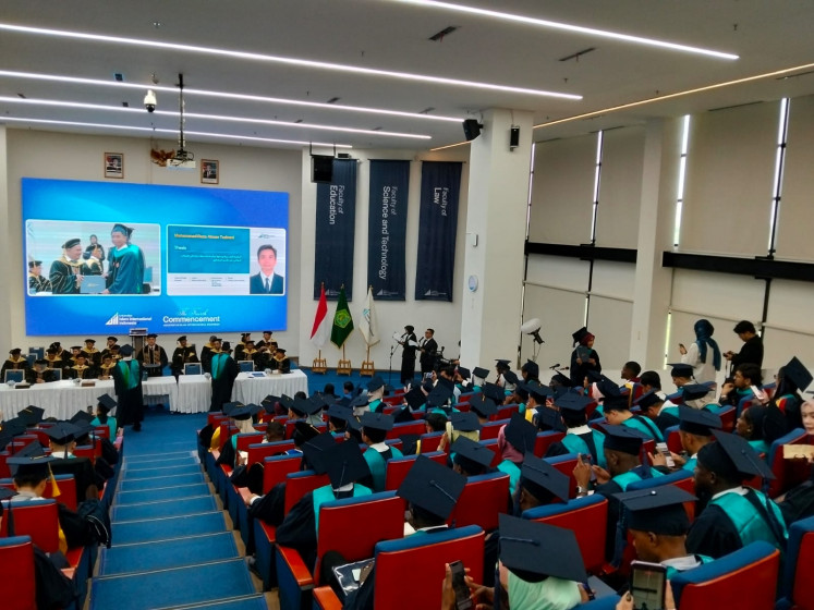 About 200 graduates of master's and doctoral programs gather for their commencement ceremony on Thursday at the Lecture Hall of the Indonesian International Islamic University (UIII) in Depok, West Java.