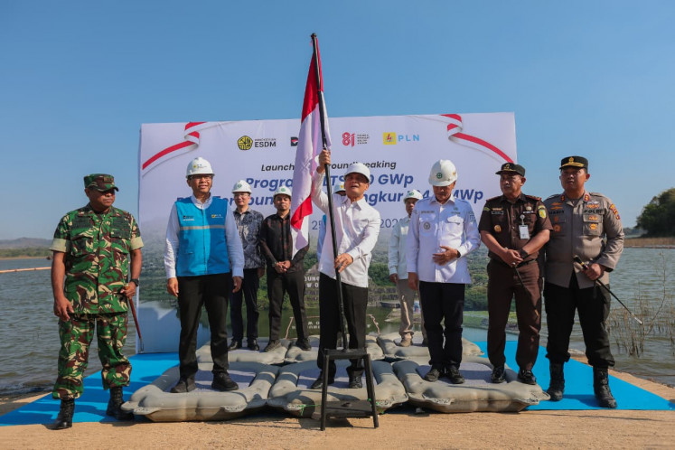 Central Java Governor Ahmad Luthfi (third left) places a Red-and-White flag marking the start of construction of the 134.2 Megawatt peak (MWp) floating solar farm at Gajah Mungkur Dam in Wonogiri, Central Java, on Aug. 25, 2026. 