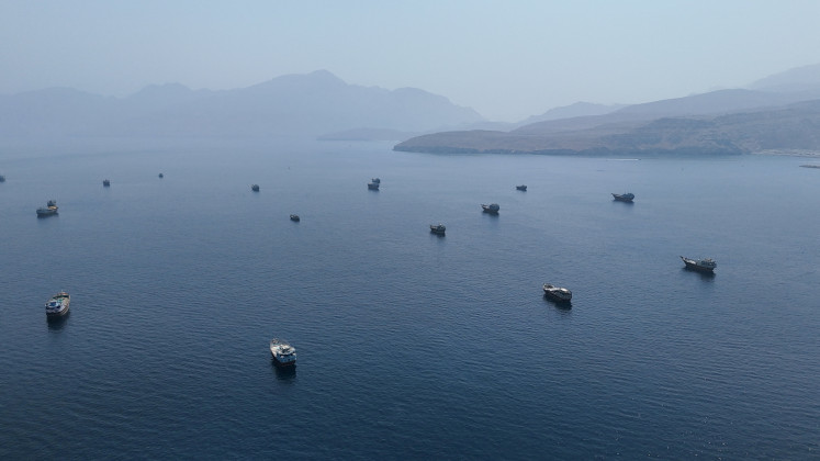 A drone view shows vessels near the Strait of Hormuz, as seen from Musandam, Oman, Aug. 28, 2026.