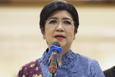 Destry Damayanti,&nbsp;Indonesia&rsquo;s newly appointed central bank governor, speaks during a press conference after her inauguration on Sept. 2 at the Supreme Court building in Jakarta.