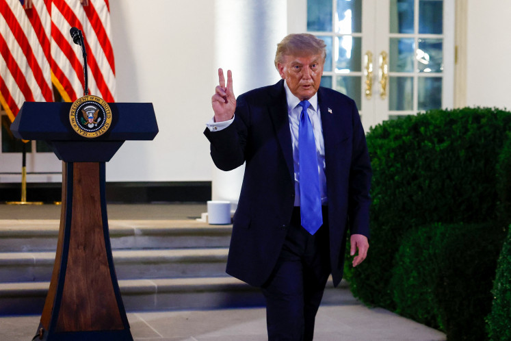 US President Donald Trump leaves the podium after speaking as he hosts a dinner in the Rose Garden at the White House on Sept. 02, 2026 in Washington, DC.