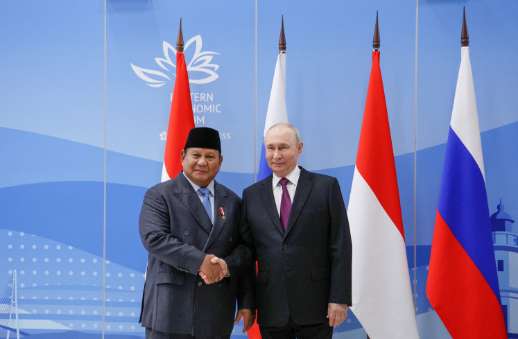 In this photograph distributed by Russian state agency Sputnik, President Prabowo Subianto and Russia's President Vladimir Putin hold a meeting on Thursday on the sidelines of the Eastern Economic Forum in Vladivostok. 