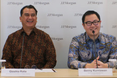 Gioshia Ralie, CEO of J.P. Morgan Indonesia (left) and Benny Kurniawan, head of equity research at J.P. Morgan Indonesia (right), speak on Thursday in a media briefing in Jakarta.