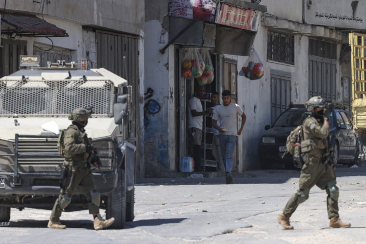 Israeli army soldiers carry out a military operation at the Askar camp for Palestinian refugees, east of Nablus in the Israeli-occupied West Bank on Sept. 4, 2026. Violence has surged in the West Bank, which Israel has occupied since 1967, since the start of the war in Gaza sparked by Hamas's October 2023 attack on Israel.