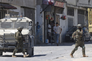 Israeli army soldiers carry out a military operation at the Askar camp for Palestinian refugees, east of Nablus in the Israeli-occupied West Bank on Sept. 4, 2026. Violence has surged in the West Bank, which Israel has occupied since 1967, since the start of the war in Gaza sparked by Hamas's October 2023 attack on Israel.
