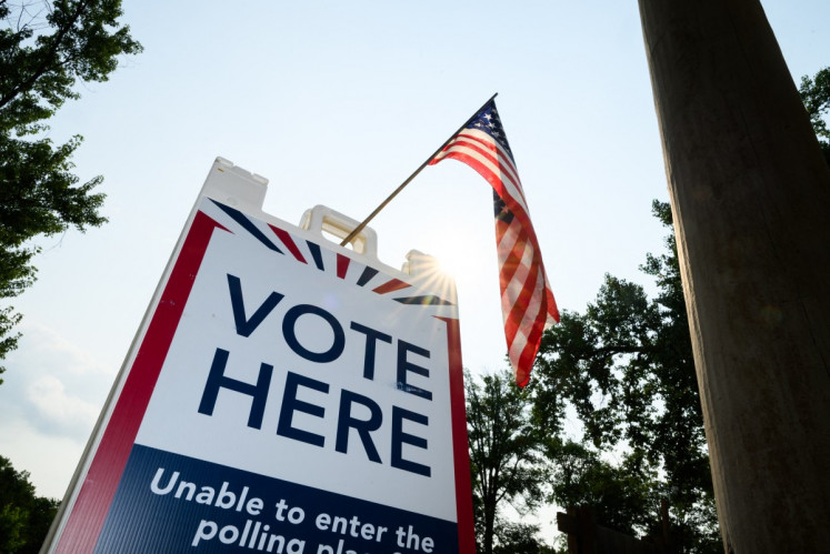 Signage directs voters at a polling place in the Tamarack Nature Center on Aug. 11, 2026 in White Bear Township, Minnesota, the United States, with Minnesota Lt. Gov. Peggy Flanagan and Rep. Angie Craig (D-MN) are vying for Minnesota's Democratic nomination for US Senate in the primary election. 
