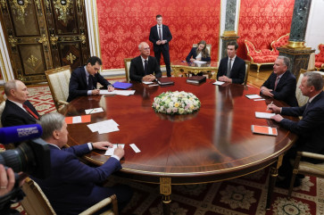 In this pool photograph distributed by the Russian state agency Sputnik, Russia's President Vladimir Putin (left), Kremlin foreign policy aide Yuri Ushakov (2nd left) and Russia's presidential envoy Kirill Dmitriev (center) attend a meeting with US special envoy Steve Witkoff (2nd right) and US President's son-in-law Jared Kushner (3rd right) in Moscow on September 5, 2026.