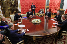 In this pool photograph distributed by the Russian state agency Sputnik, Russia's President Vladimir Putin (left), Kremlin foreign policy aide Yuri Ushakov (2nd left) and Russia's presidential envoy Kirill Dmitriev (center) attend a meeting with US special envoy Steve Witkoff (2nd right) and US President's son-in-law Jared Kushner (3rd right) in Moscow on September 5, 2026.