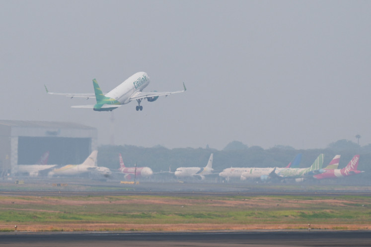A Citilink Airbus takes off from Soekarno-Hatta International Airport, as the airport reopened following the eruption of Mount Anak Krakatau, in Tangerang, Banten, on Sept. 8, 2026. 