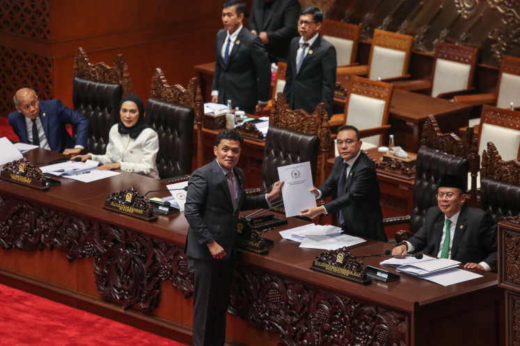 House Deputy Speaker Sufmi Dasco Ahmad (second right) receives a report on the progress of drafting the Asset Forfeiture Bill from Commission III chairman Habiburokhman (center) during the House&rsquo;s third plenary session of the 2026&ndash;2027 legislative year on Aug. 27 at the Senayan Legislative Complex in Central Jakarta. Commission III said it expects to complete the bill by Dec. 15. 