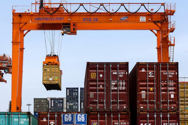 A container is loaded onto a cargo ship on April 16, 2025, at the Port Hai Phong in Northern Vietnam.