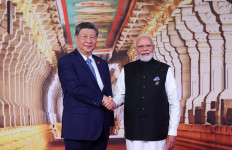 Warming ties: India&rsquo;s Prime Minister Narendra&nbsp;Modi&nbsp;shakes hands with Chinese President&nbsp;Xi&nbsp;Jinping&nbsp;on Saturday at Bharat Mandapam, the venue of the BRICS Summit in New Delhi.