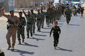 Fighters loyal to the Houthi authorities, march during a rally to recruit more fighters, in Sanaa on September 10, 2026. 