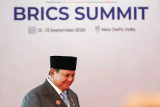 In this photo distributed by the Russian state agency Sputnik, President Prabowo Subianto arrives on Saturday before the start of the 18th BRICS Summit in New Delhi. (Photo by Alexander KAZAKOV / POOL / AFP)