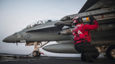 This handout picture released by the US Navy on September 13, 2026, shows a US Sailor checking ordnance on an FA-18 Super Hornet, attached to Strike Fighter Squadron (VFA) 102, aboard Nimitz-class aircraft carrier USS George Washington (CVN 73) on September 13, 2026.
The USS George H.W. Bush Carrier Strike Group is deployed to the US 5th Fleet area of operations to support maritime security and stability in the Middle East.