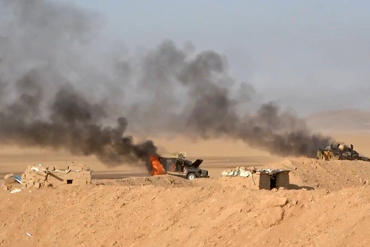 This handout picture released on September 15, 2026 by Ansarullah Media Centre reportedly shows burning military vehicles that they targeted in al-Jawf, Saudi Arabia. The Houthis have been engaged in renewed fighting with Saudi-backed government forces since Yemen's civil war reignited in July, when the group declared a maritime blockade on Riyadh and began targeting its ships in the Red Sea. 