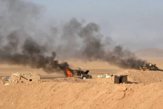 This handout picture released on September 15, 2026 by Ansarullah Media Centre reportedly shows burning military vehicles that they targeted in al-Jawf, Saudi Arabia. The Houthis have been engaged in renewed fighting with Saudi-backed government forces since Yemen's civil war reignited in July, when the group declared a maritime blockade on Riyadh and began targeting its ships in the Red Sea. 