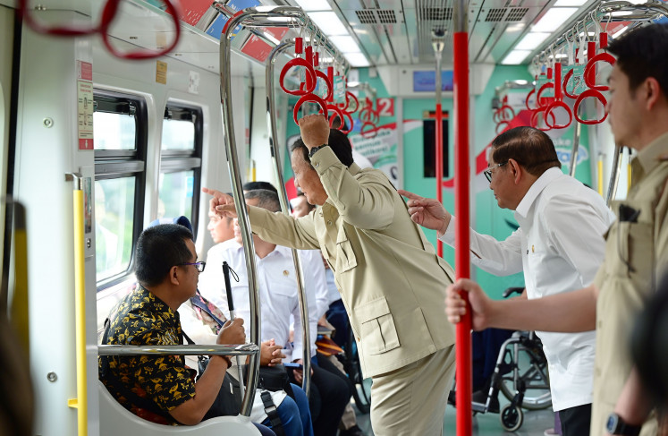 President Prabowo Subianto (second left) and Jakarta Governor Pramono Anung (second
right) test the Jakarta light rapid transit (LRT)&rsquo;s extension from North Jakarta to Manggarai,
South Jakarta, on Wednesday, Sept. 16, 2026.