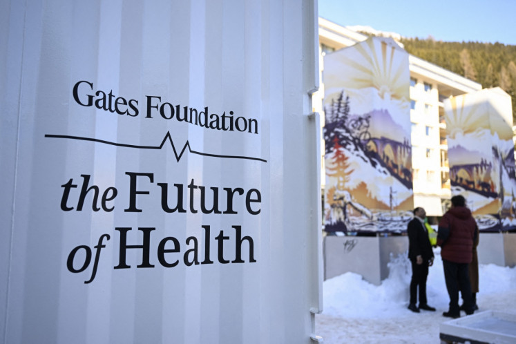 A banner showing the logo of the Gates Foundation, a United States private foundation founded by Bill Gates and Melinda French Gates, during the World Economic Forum (WEF) annual meeting in Davos, Switzerland on Jan. 20, 2026.
