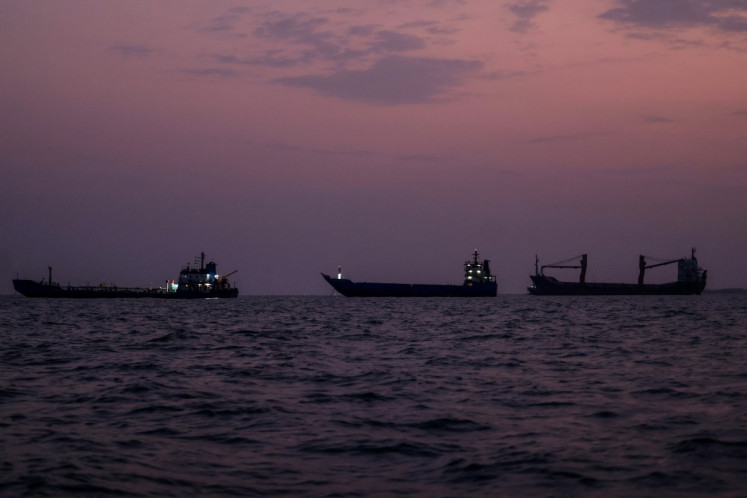Vessels transit the Strait of Hormuz off the coast of the port city of Bandar Abbas in southern Iran on September 5, 2026.