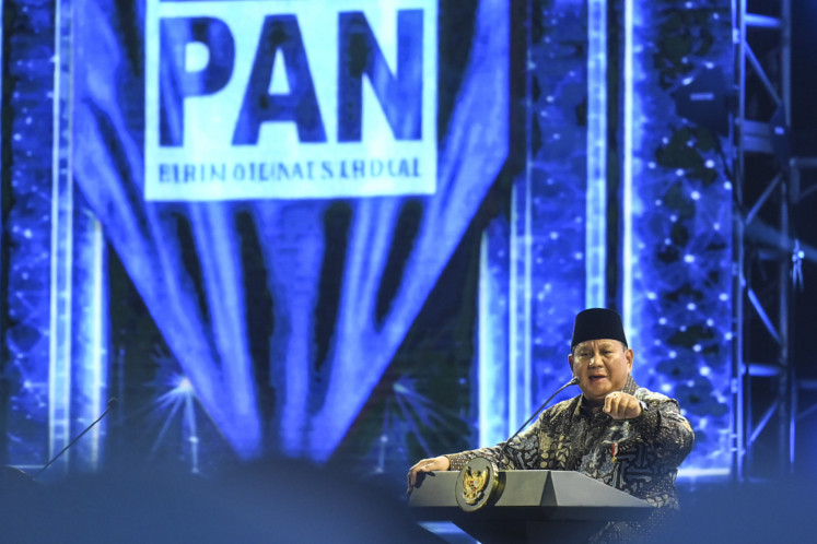 President Prabowo Subianto gestures on Friday while speaking at the 28th anniversary event of National Mandate Party (PAN) in Jakarta. PAN is a member of Prabowo&rsquo;s ruling coalition.