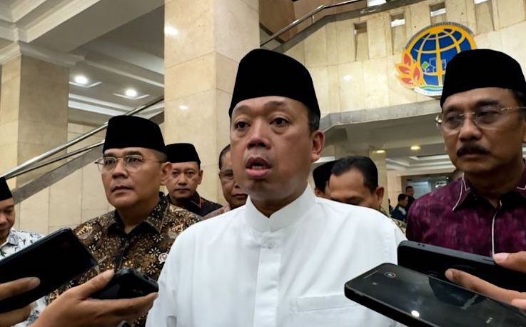 Agrarian and Spatial Planning Minister Nusron Wahid answers questions from journalists in Jakarta on Sept. 18, 2026.