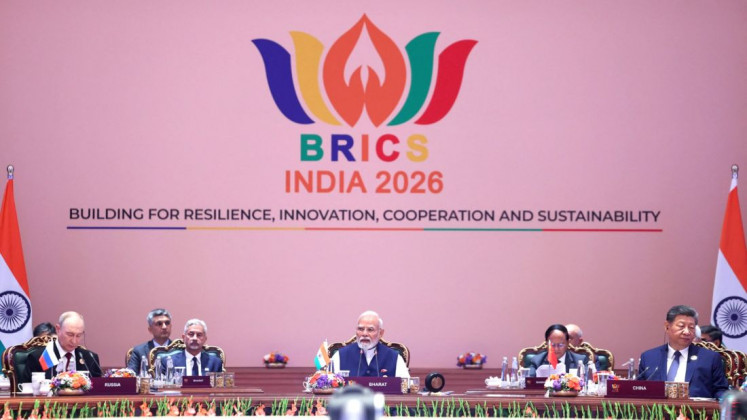 Balancing act: Indian Prime Minister Narendra Modi (center) presides over the second and final day of the 18th BRICS Summit in New Delhi on Sept. 13, 2026, flanked by Russian President Vladimir Putin (left, front), and Chinese President Xi Jinping (right, front).