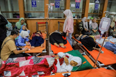 Students rest while receiving treatment for food poisoning at the regional general hospital after eating government-sponsored free school meals in Sidoarjo, East Java province, Indonesia, September 2, 2026. 