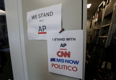 An updated solidarity sign adding CNN, MSNOW and 'POLITICO' hangs outside the Associated Press booth at the White House grounds after United States President Donald Trump banned three major news outlets, CNN, MS NOW and Politico, from the White House, in Washington, D.C., the US, on Sept. 21, 2026.