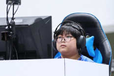 Japan's Yuki Kurihara competes in the Puyo Puyo Champions final of the eSports event during the 2026 Asian Games at the Aichi Sky Expo in Tokoname, Japan on Sept. 26, 2026. Japan's 11-year-old eSports prodigy Yuki Kurihara won Asian Games gold in style after thrashing a series of opponents up to three times his age.