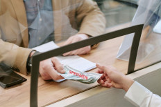 BRI Money Changer is available at various strategic locations across Indonesia, making it convenient for customers to exchange foreign currency. The illustration was created with the help of AI. (Courtesy of AI)